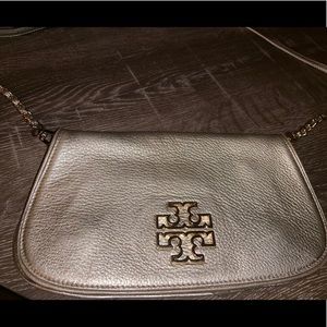 Tory Burch metallic cross body bag.